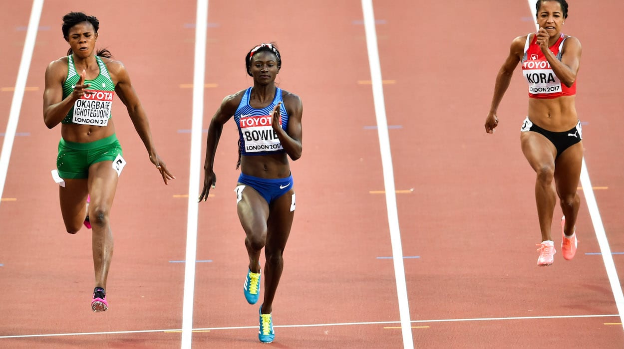 Tori Bowie (C) races in the 100 m semifinal at the 2017 London World Championships, where she then took the gold medal in the final.
